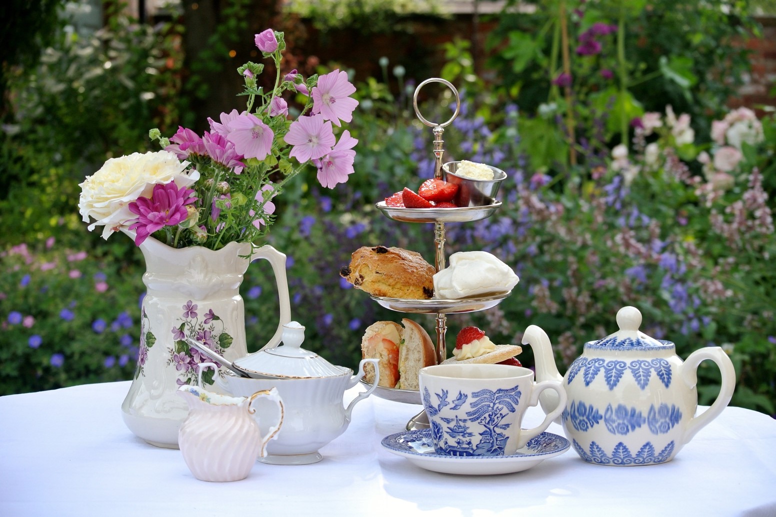 table in garden set for afternoon tea